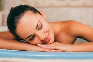 woman-relaxing-with-closed-eyes-at-spa-salon