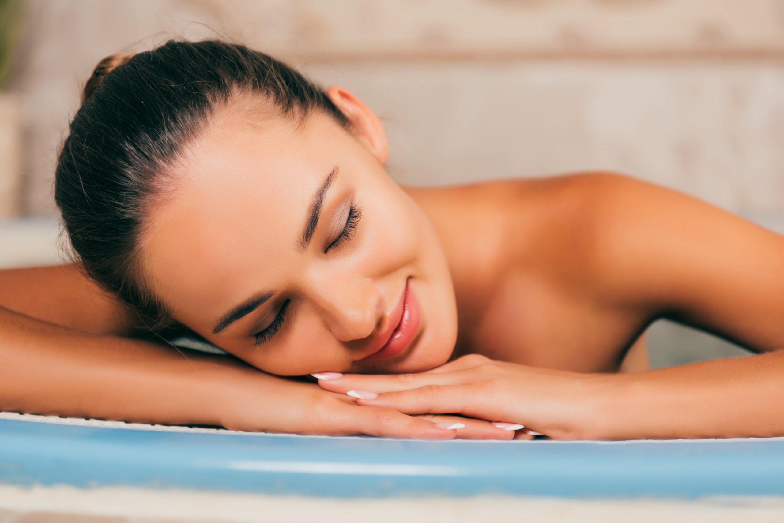 woman-relaxing-with-closed-eyes-at-spa-salon