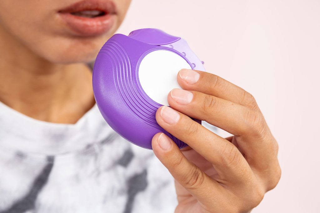 female-using-asthma-inhaler-unrecognizable-woman