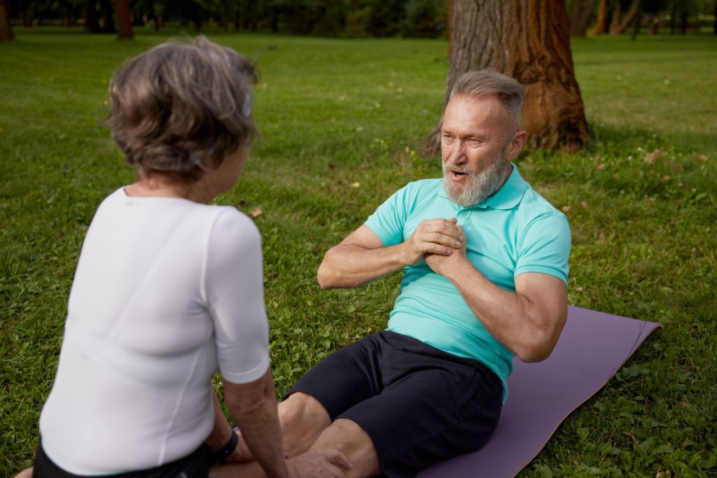 happy-older-couple-of-retirees-doing-training-work