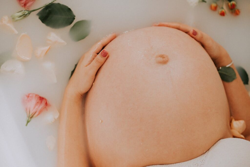 pregnant lady in a bath tub