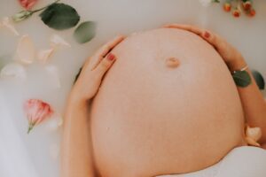 pregnant lady in a bath tub