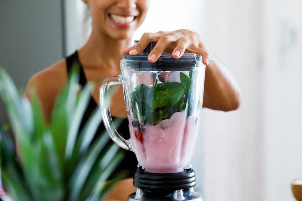 Woman making a smoothie